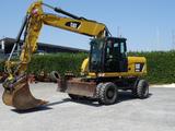 CAT M316 D mit OQ 70/55 - CAT Raupe/Dozer D5