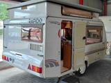 Rapido Club 32 T mit Sitz /Schlaf Sofa  Hubdach 850 kg - Rapido Wohnwagen