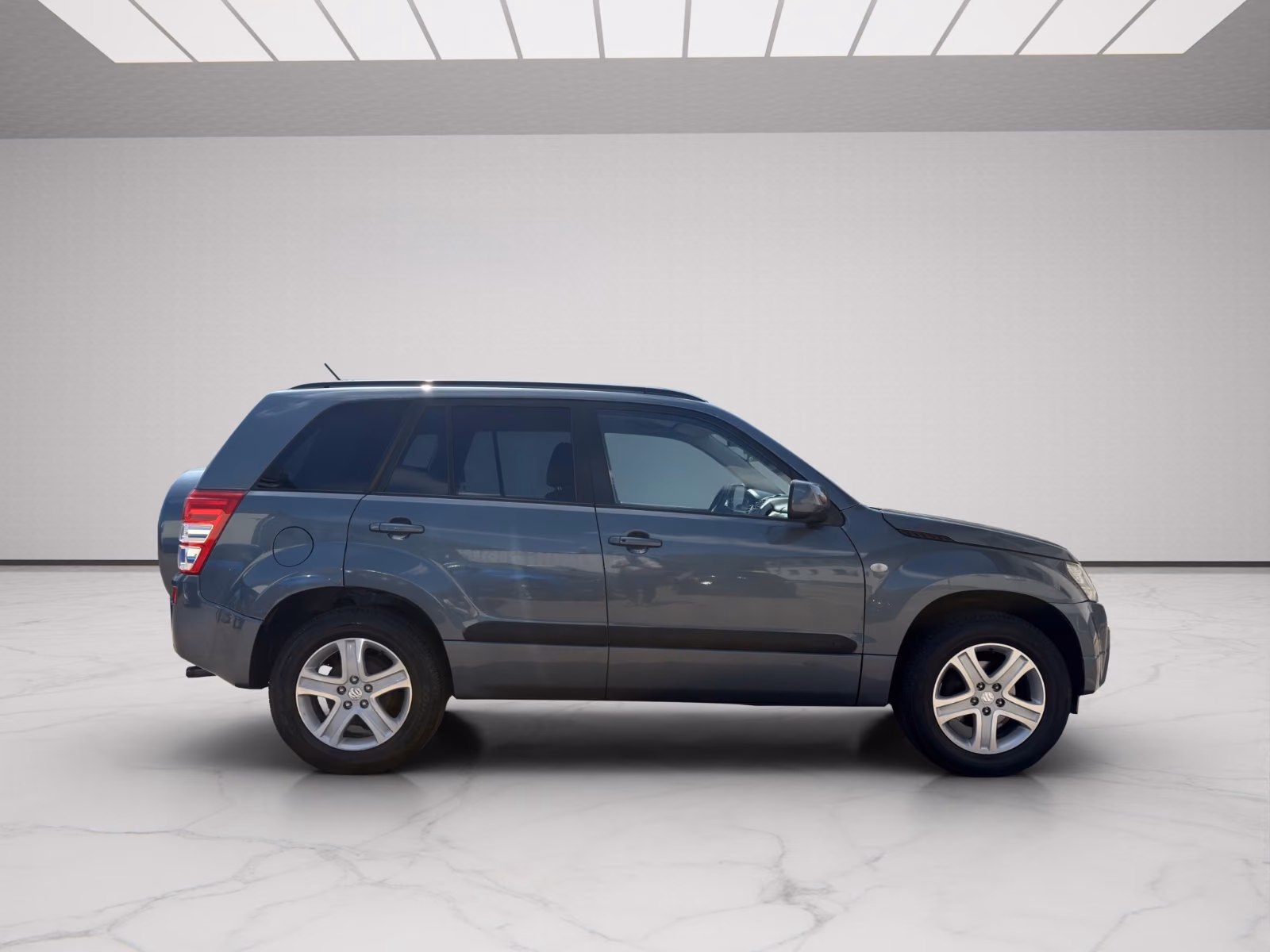 Suzuki Grand Vitara 2.0 140 ch Comfort+ • BVA • 4x4 • Toit ouvrant • Sièges chauffants
