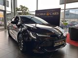 Toyota Corolla Hybrid Club LED NAV DAB PDC ALU - mit Hybrid-Antrieb: Braun, Limousine