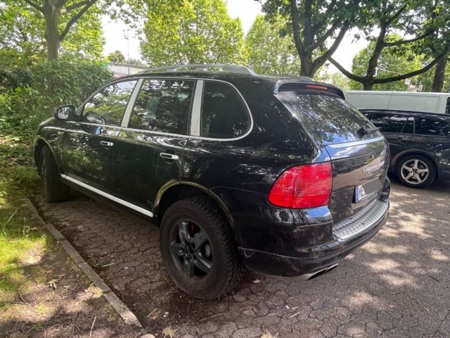 Porsche PORSCHE CAYENNE TURBO SCHECKHEFT bei Porsc...