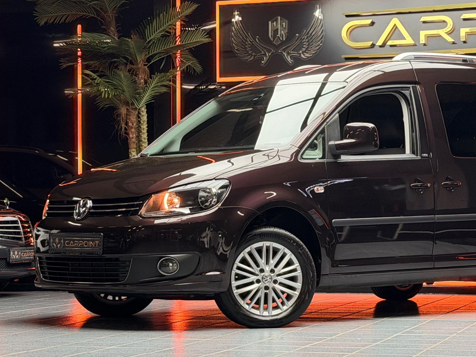 Volkswagen Caddy Maxi Kombi / Navi /7-Sitzer/Rollstuhl-Kran