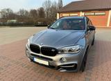 BMW X6 M50d Scheckheftgepflegt bei BMW. In einem top - graue BMW X6 M50