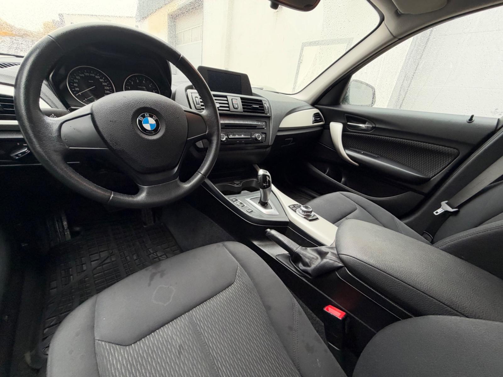 BMW 116 2014 — photo 16