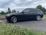 BMW 330d Touring Sport Line Automatic Sport Line - BMW 330 mit Diesel-Antrieb: Schwarz, Kombi