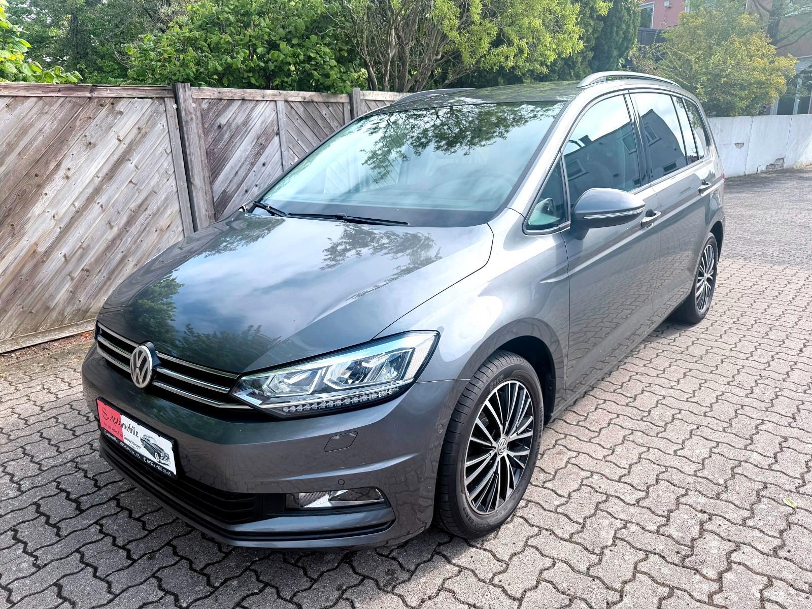 Volkswagen Touran Comfortline°7-Sitzer°Navigation°Xenon