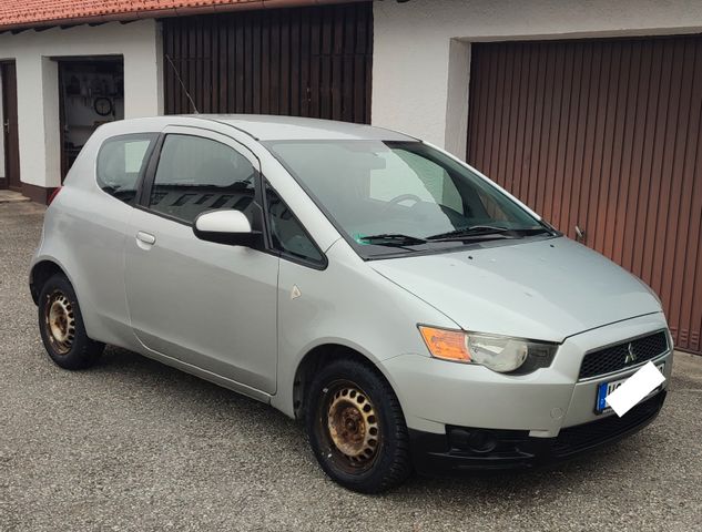 Mitsubishi Colt Winterauto. Neue Winterreifen 