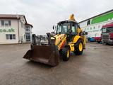 New Holland tractorbager  4x4 LB110B-4P vin 028 - New Holland Schlepper