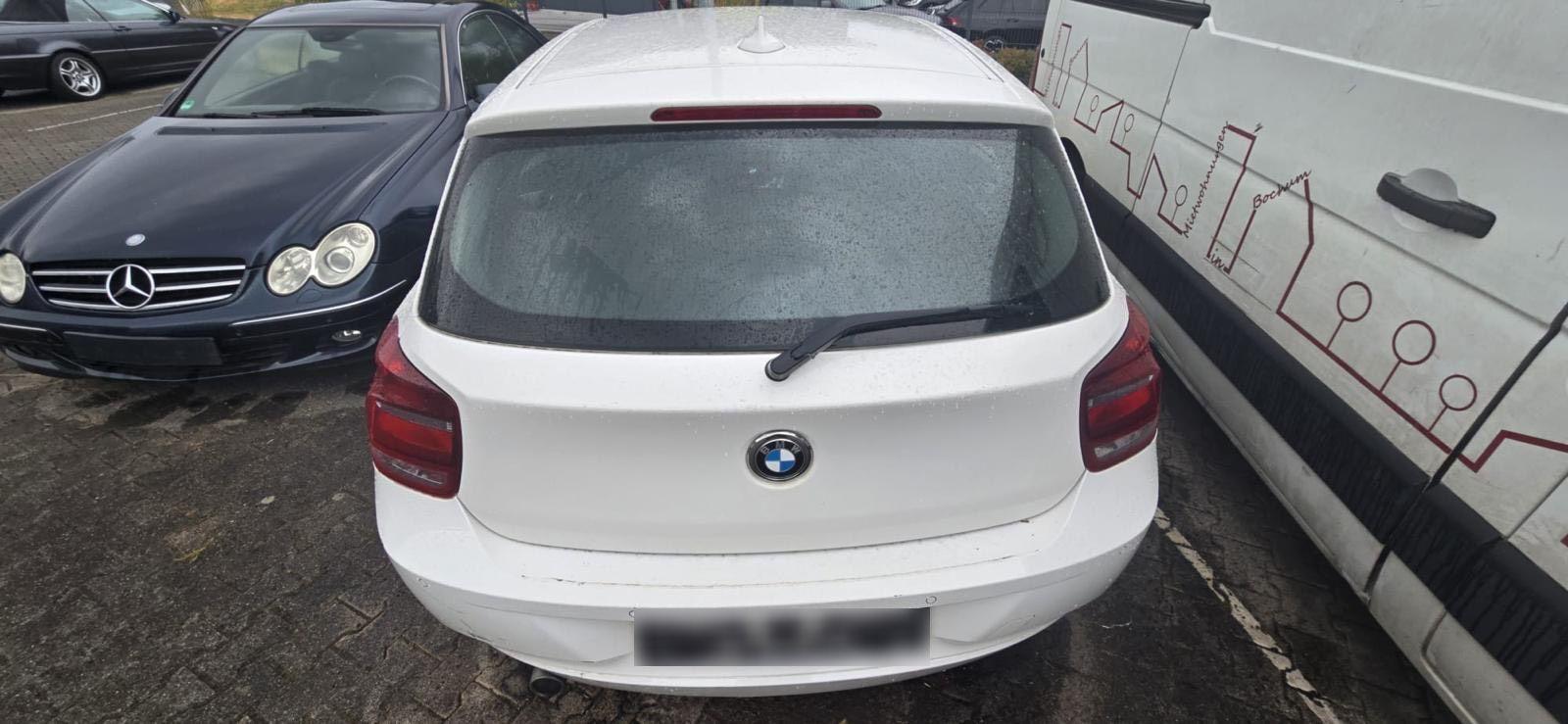 BMW 114 2014 — photo 9