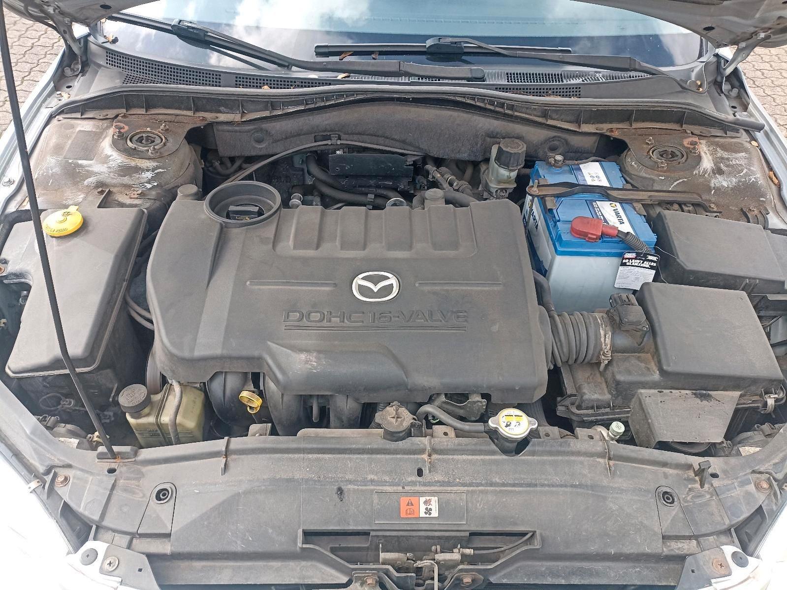 Mazda 2 2004 — photo 12