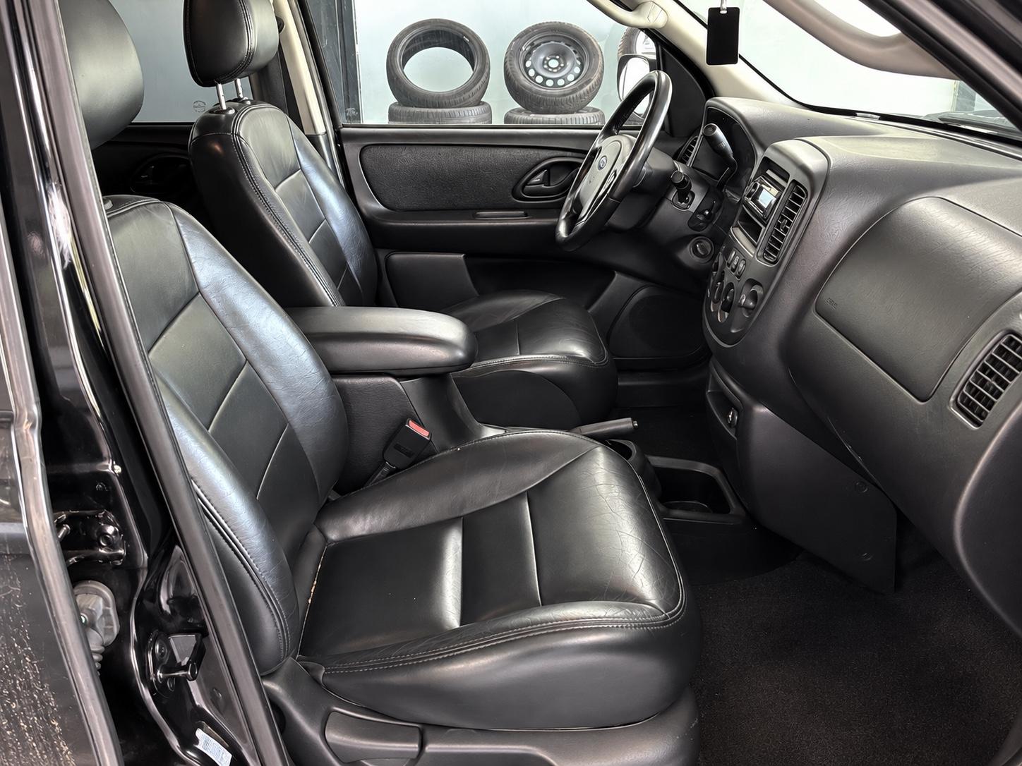 Ford Maverick 2004 — photo 12