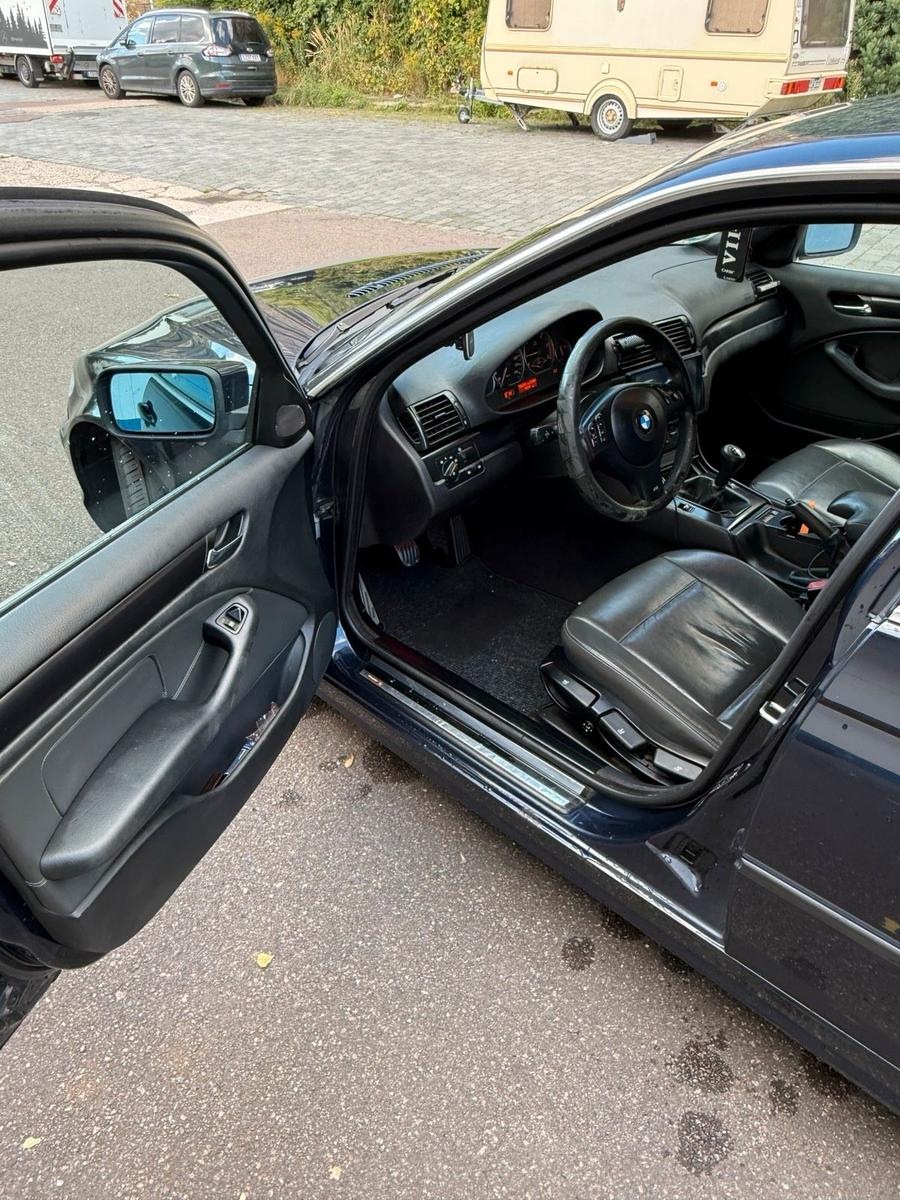 BMW 318 2004 — photo 12