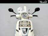 Peugeot Django Evasion 125 - PEUGEOT ROLLER
