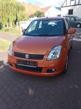 Suzuki Swift Lim. Comfort,Klima,Zv,Alu,1.Hand ,TÜV 4.27 - Suzuki Swift mit Benzin-Antrieb: Orange