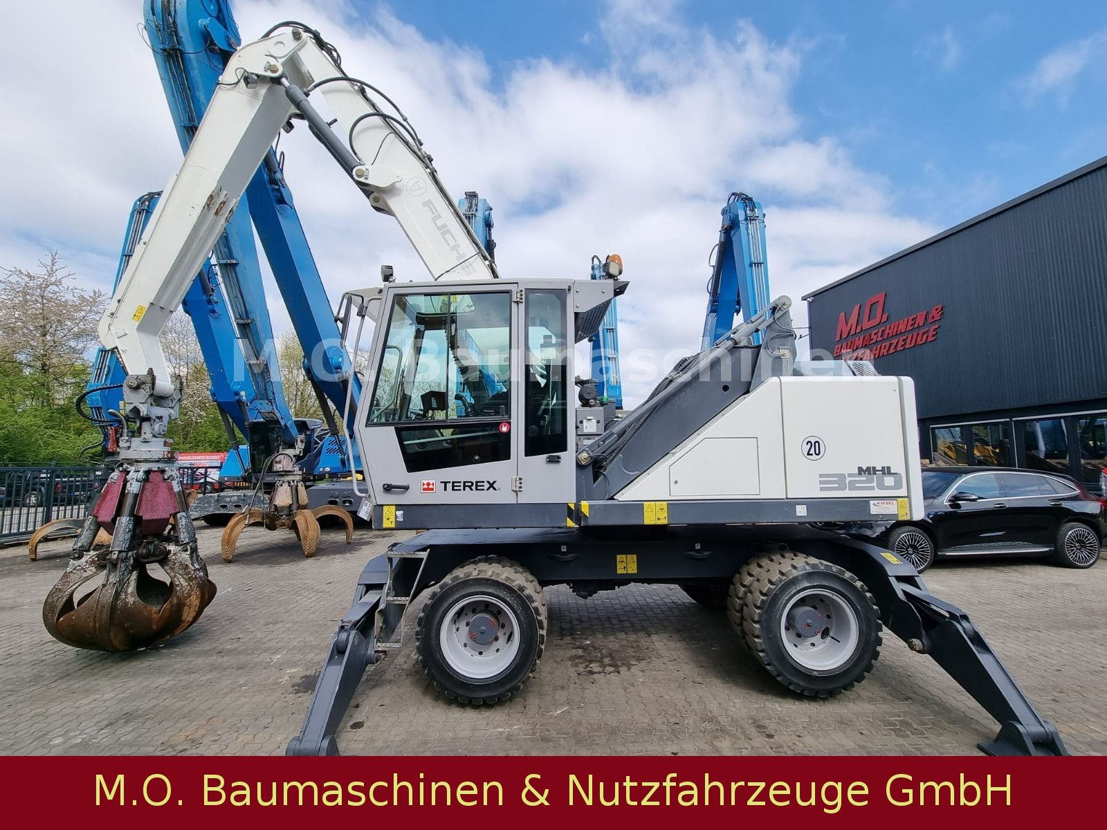 Fahrzeugabbildung Terex Fuchs MHL 320 / AC /  Polypgreifer