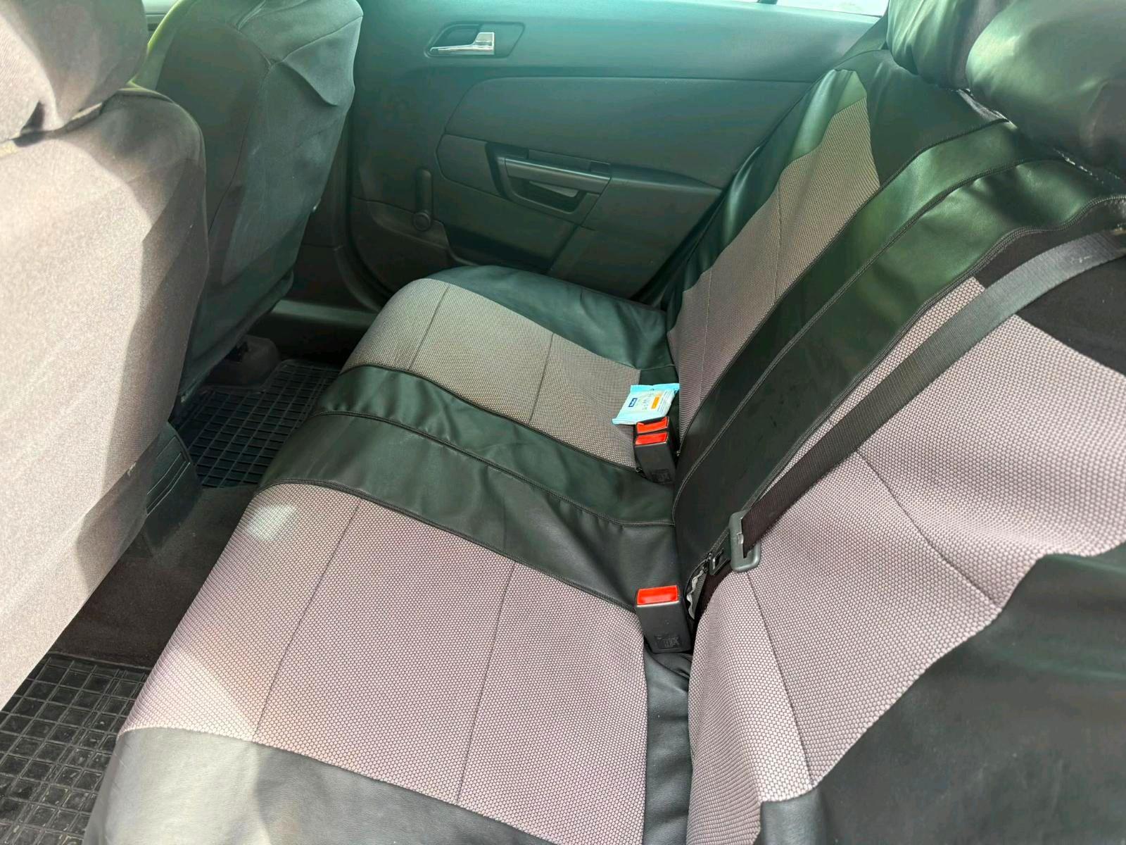 Opel Astra 2005 — photo 13