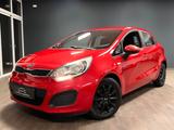 Kia Rio 1.2 Edition 7 / 1.HAND / KLIMA / SIGNAL RED - gebrauchte Kia Rio aus dem Jahr 2013