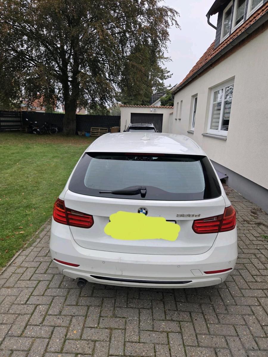 BMW 320 2013 — rear view