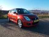 Suzuki Swift Lim. Comfort - Suzuki Swift mit Benzin-Antrieb: Orange