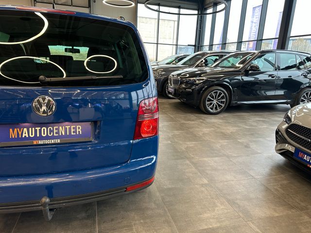 Volkswagen Touran  *7Sitzer*Navi*DSG*Sitzh*BiXenon*