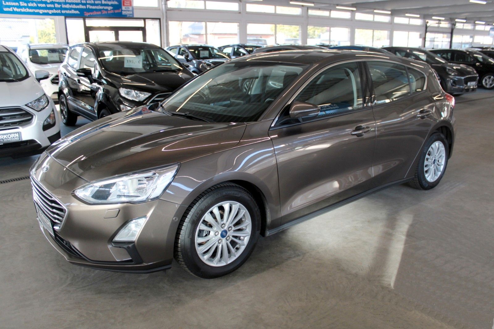 Fahrzeugabbildung Ford Focus Titanium DAB CAM ParkAssistent SHZ FSH uvm