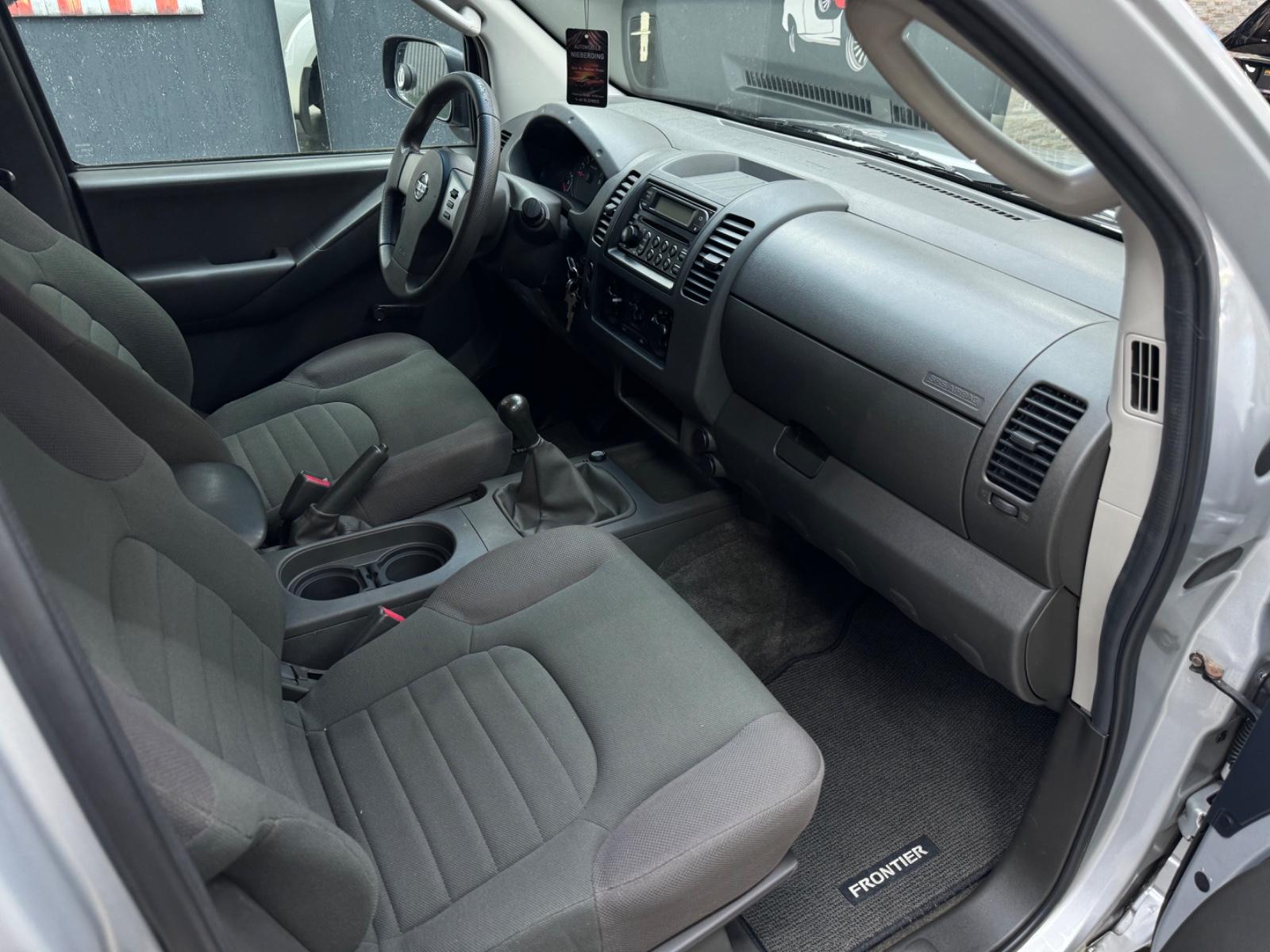 Nissan Frontier 2005 — photo 24