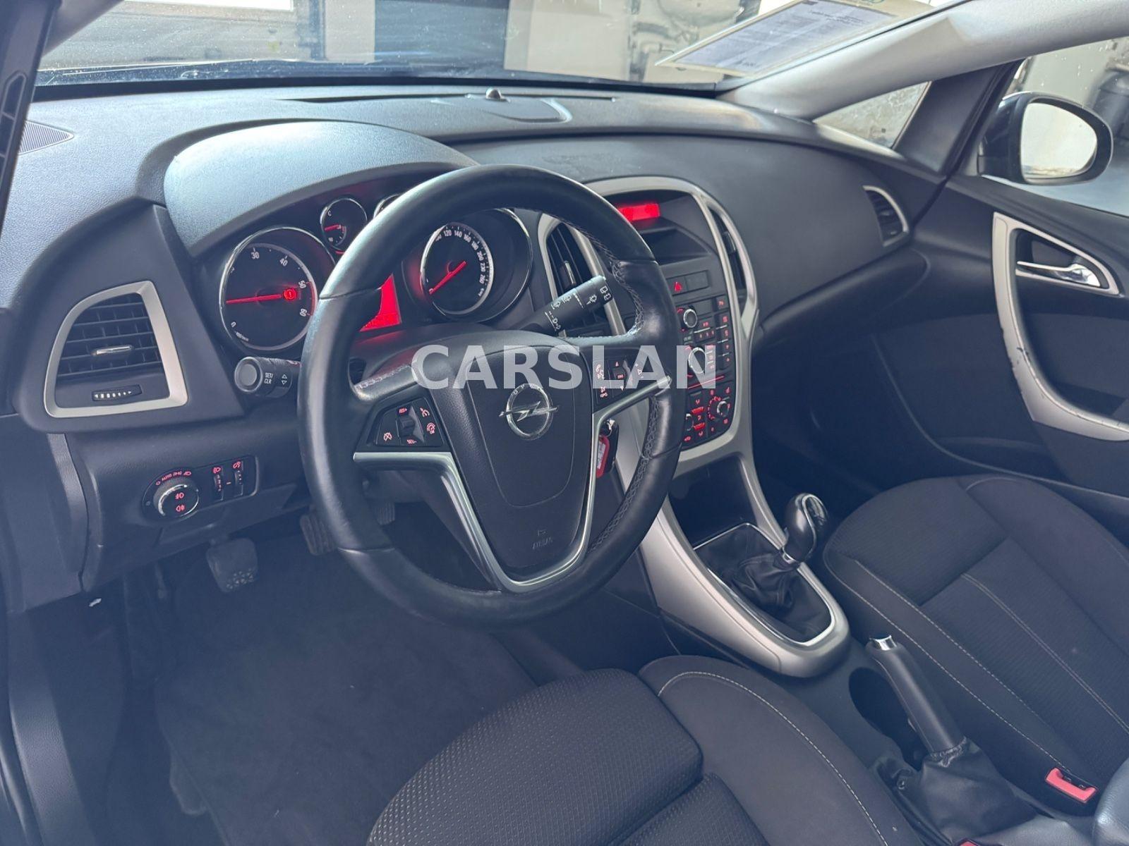 Opel Astra 2013 — photo 19