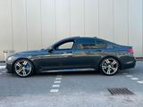 BMW 750d xDrive -M panorama carbonschwarz - blaue BMW 750