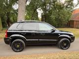 Hyundai TUCSON 2.0 GLS 2WD+Leder+Navi+AHK+PDC+8X.LM - Hyundai TUCSON: Gls