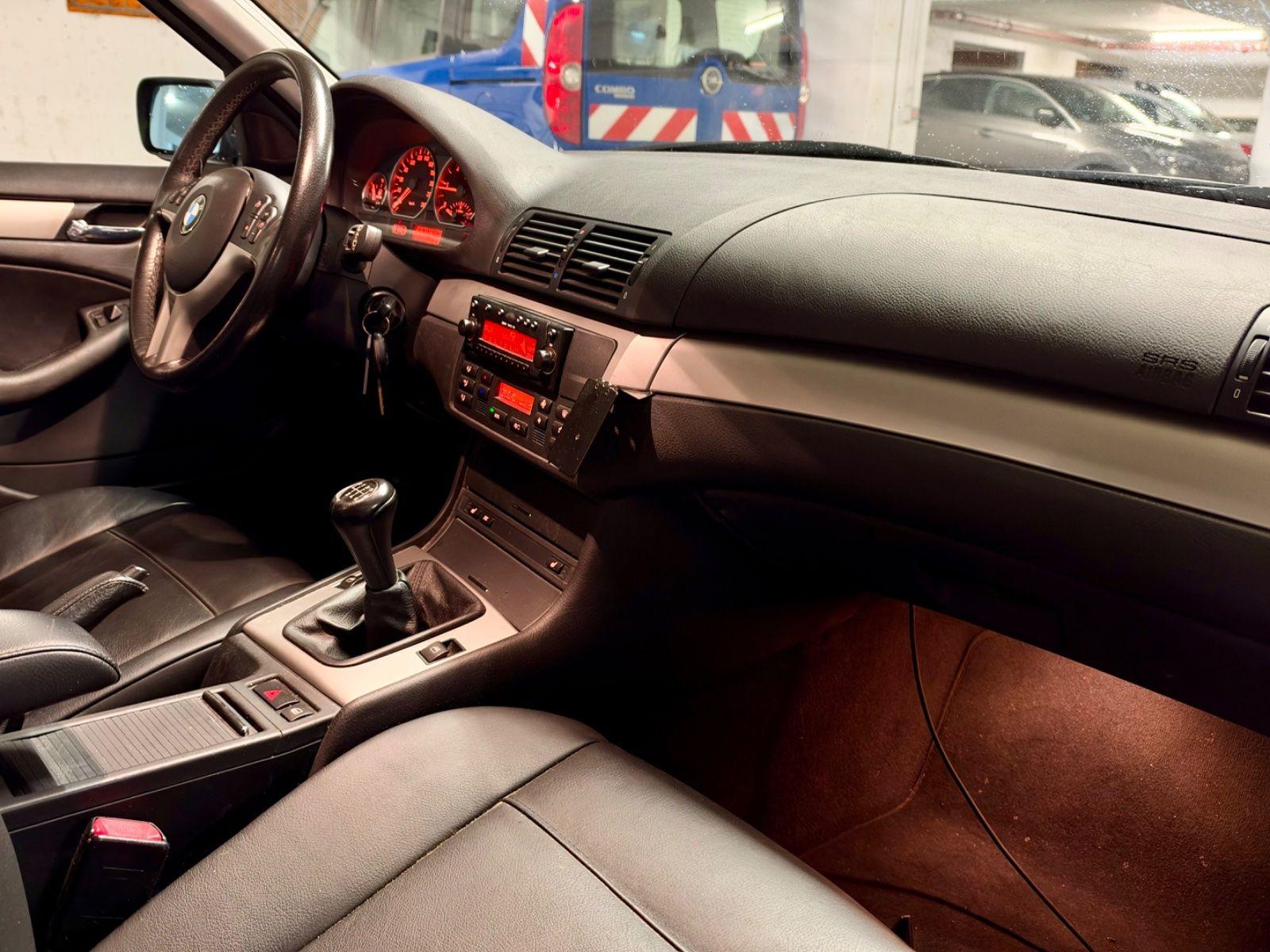 BMW 320 2005 — photo 12