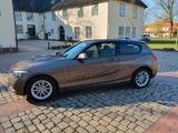 BMW 114i - - BMW 1er Reihe: Braun