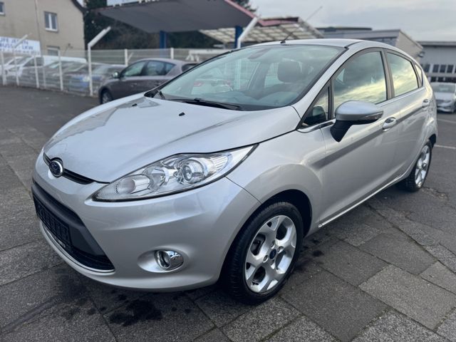 Ford Fiesta 1.25 Titanium *8F.Bereift,1Hand,Klimaau*