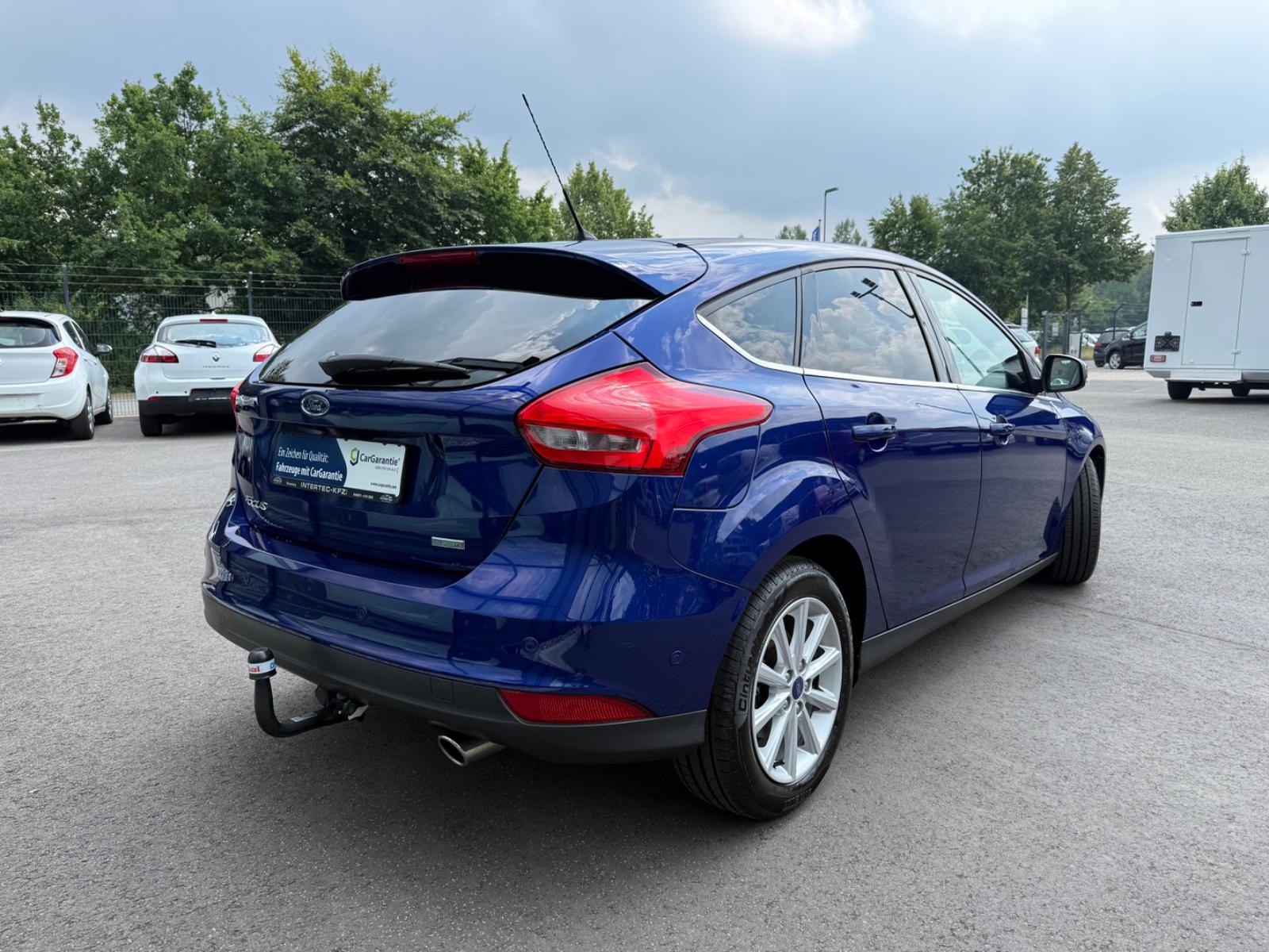 Ford Focus Lim. Titanium Autom.*NAVI*CAM*PDC*SHZ*AHK*