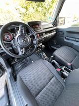 Suzuki Jimny 1.5 Comf.+/8-fach Reif., Sitzumbau >190cm - gebrauchte Suzuki Jimny aus dem Jahr 2021