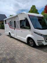 Roller Team Kronos 284 integral mit Hubbett und Einzelbetten - Wohnmobil oder -wagen mit Hubbett
