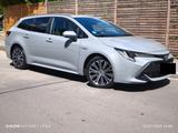 Toyota Corolla 2,0 Hybrid Team Deutsch Touring Spor... - Toyota Corolla mit Benzin-Antrieb: Kombi