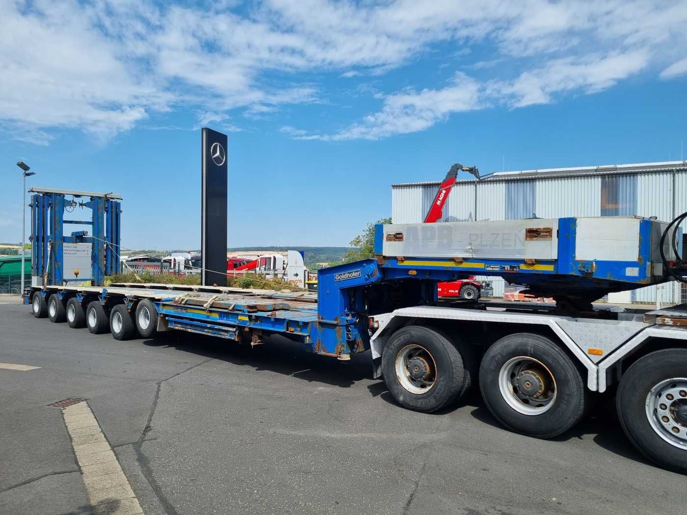 Fahrzeugabbildung Goldhofer STZ-H6-57/80A Teleskop-Tieflader Waggontransport
