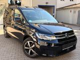 Volkswagen Caddy Dark Label 4Motion - Volkswagen: 4motion