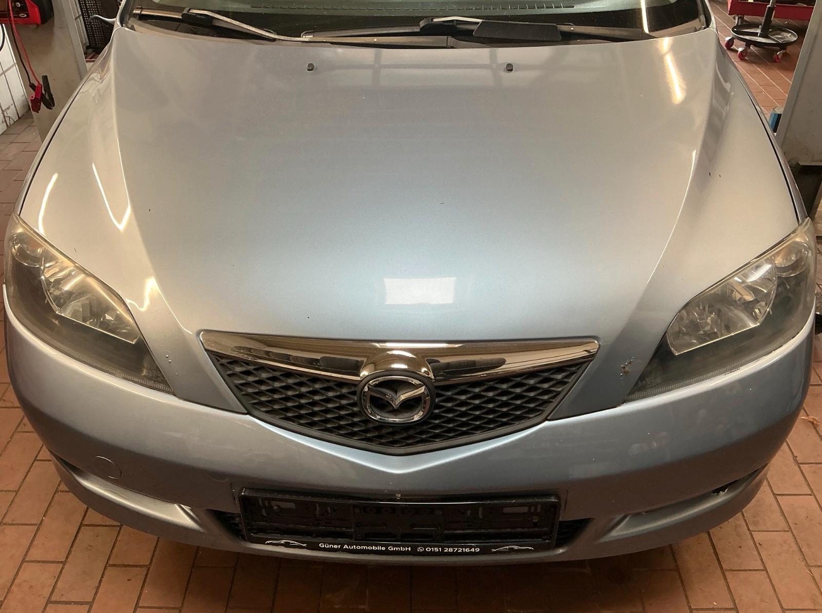 Mazda 2 2005 — photo 13