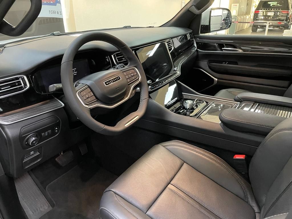 Fahrzeugabbildung Jeep WAGONEER SERIES III E-TORQUE 5.7L-V-8 McIntosh