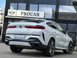 BMW X6 M50d Laser Pano AHK DA Prof PA+ HuD B&W Softc - BMW X6 M50 aus 2020