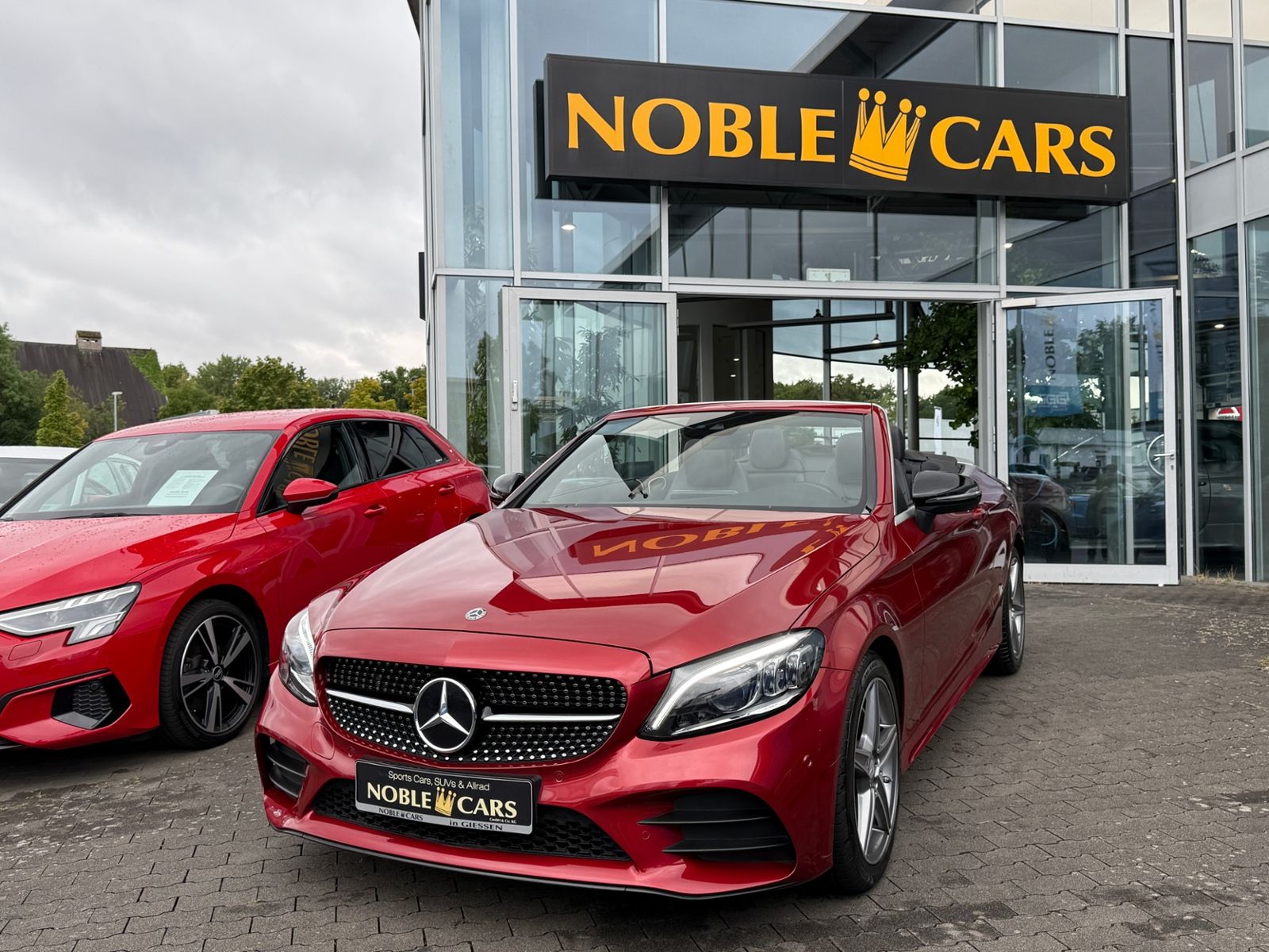 Fahrzeugabbildung Mercedes-Benz C 200 Cabrio AMG NIGHT Navi Rückfahr KAM Sounds.