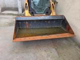 CAT 226D3 Lader mit Schwergutschaufel - CAT D3
