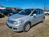 Nissan Tiida Acenta 1.8 HU/AU 03.2028 (089) - silberne Nissan Tiida