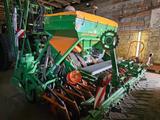 Amazone Drille AD-P 403 Super und Kreiselgrubber KG 4000 - Amazone LKWs