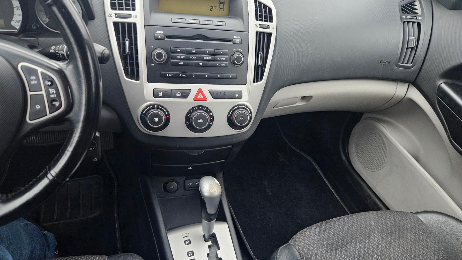 Kia cee'd 2009 — photo 12