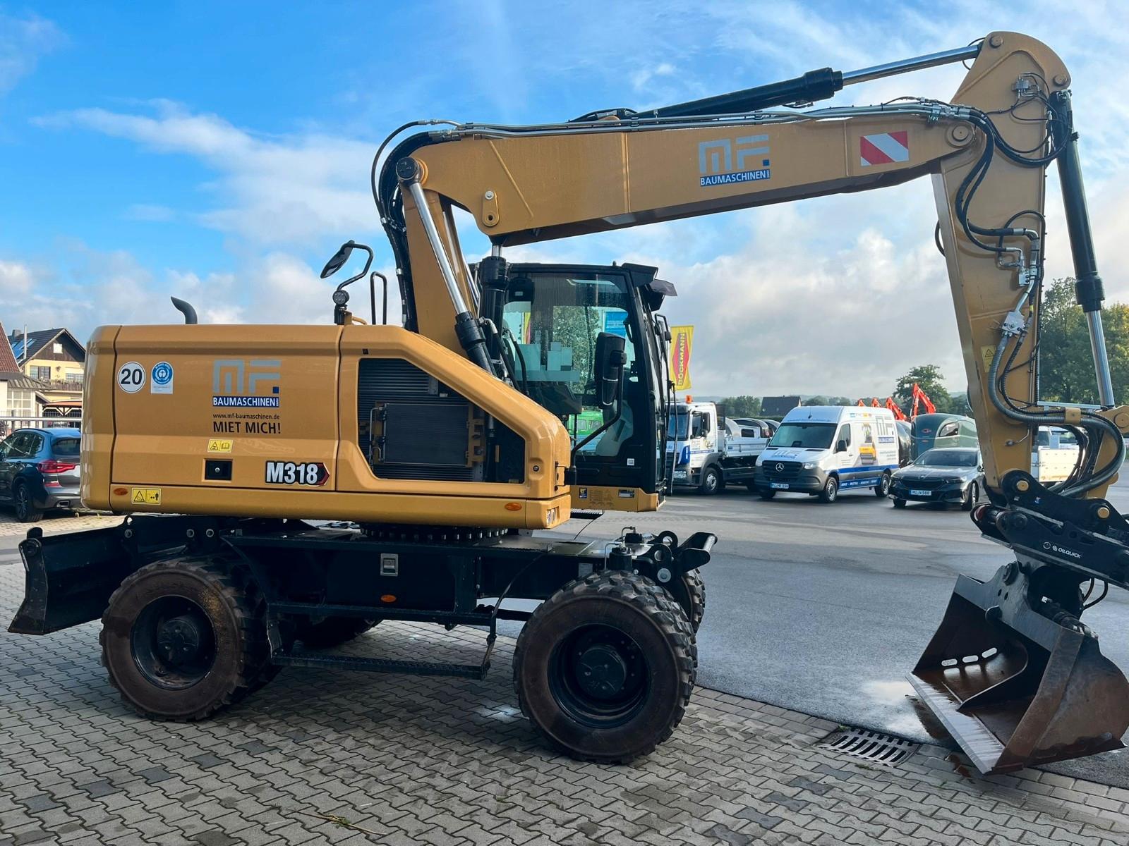 CAT M318  OQ70/55