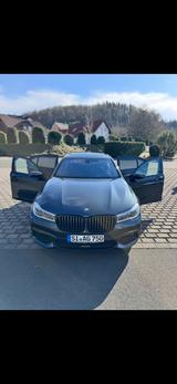 BMW 750i xDrive - - graue BMW 750