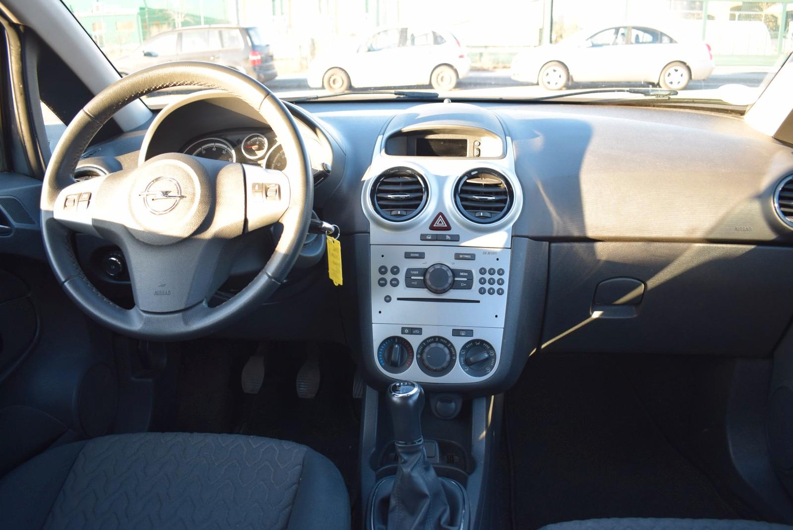 Opel Corsa 2013 — photo 18