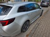 Toyota Corolla 1,8 Hybrid Team Deutschl Touring Spo... - gebrauchte Toyota Corolla aus dem Jahr 2024